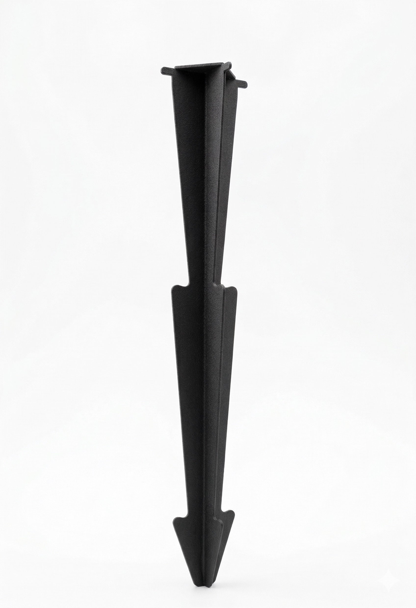 Black plastic tent stake on a white background