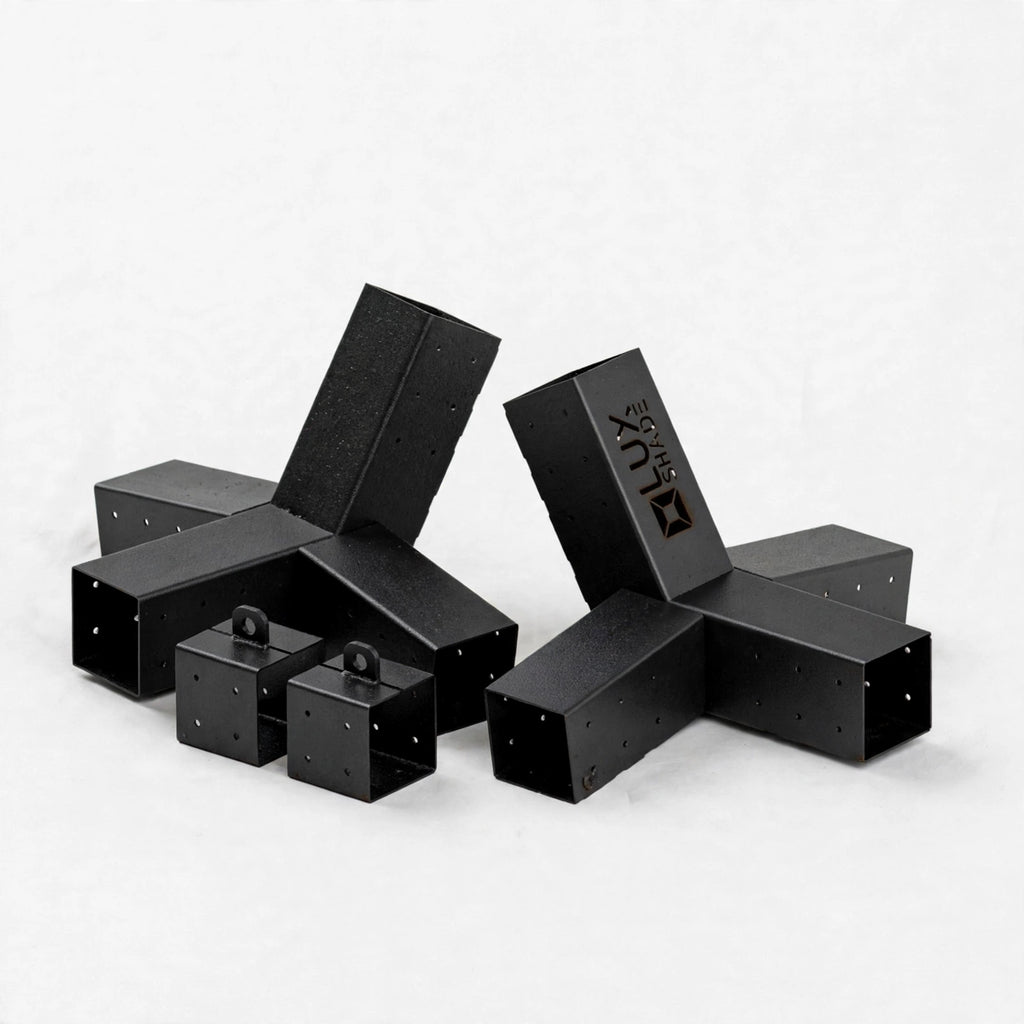 Black metal 3D-printed 3D-printing accessories, including three T-brackets and three small cube blocks with mounting holes, arranged on a light gray background. One of the T-brackets features the brand name 'KUKU' printed on its side.